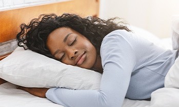 Woman resting in bed