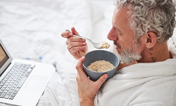 Man eating oatmeal