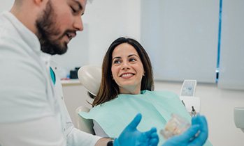 Woman smiling at the dentist
