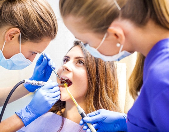 Woman at dentist in Little Rock getting dental crown